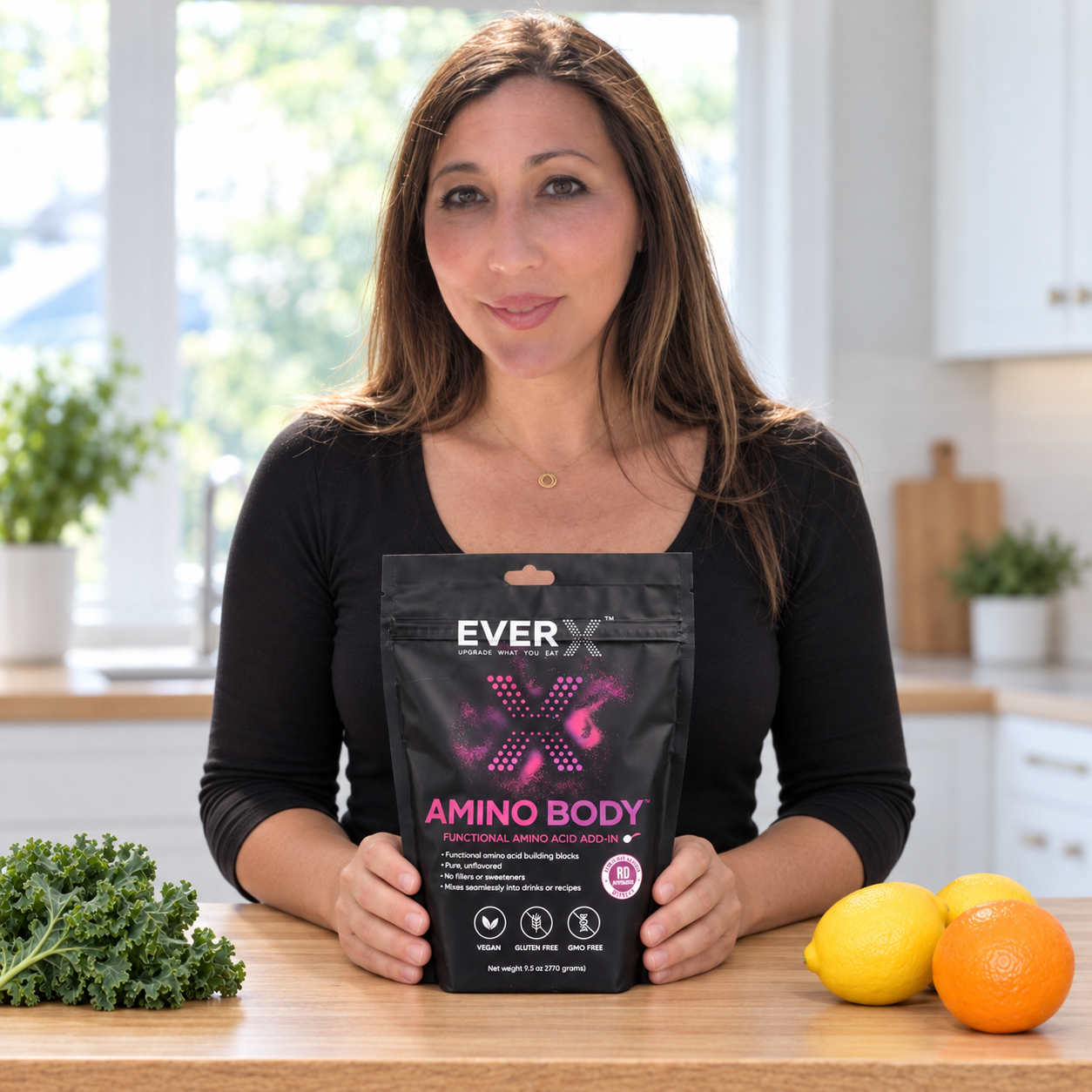 Rachael Richardson, RDN holding EverX AminoBody™ pouch